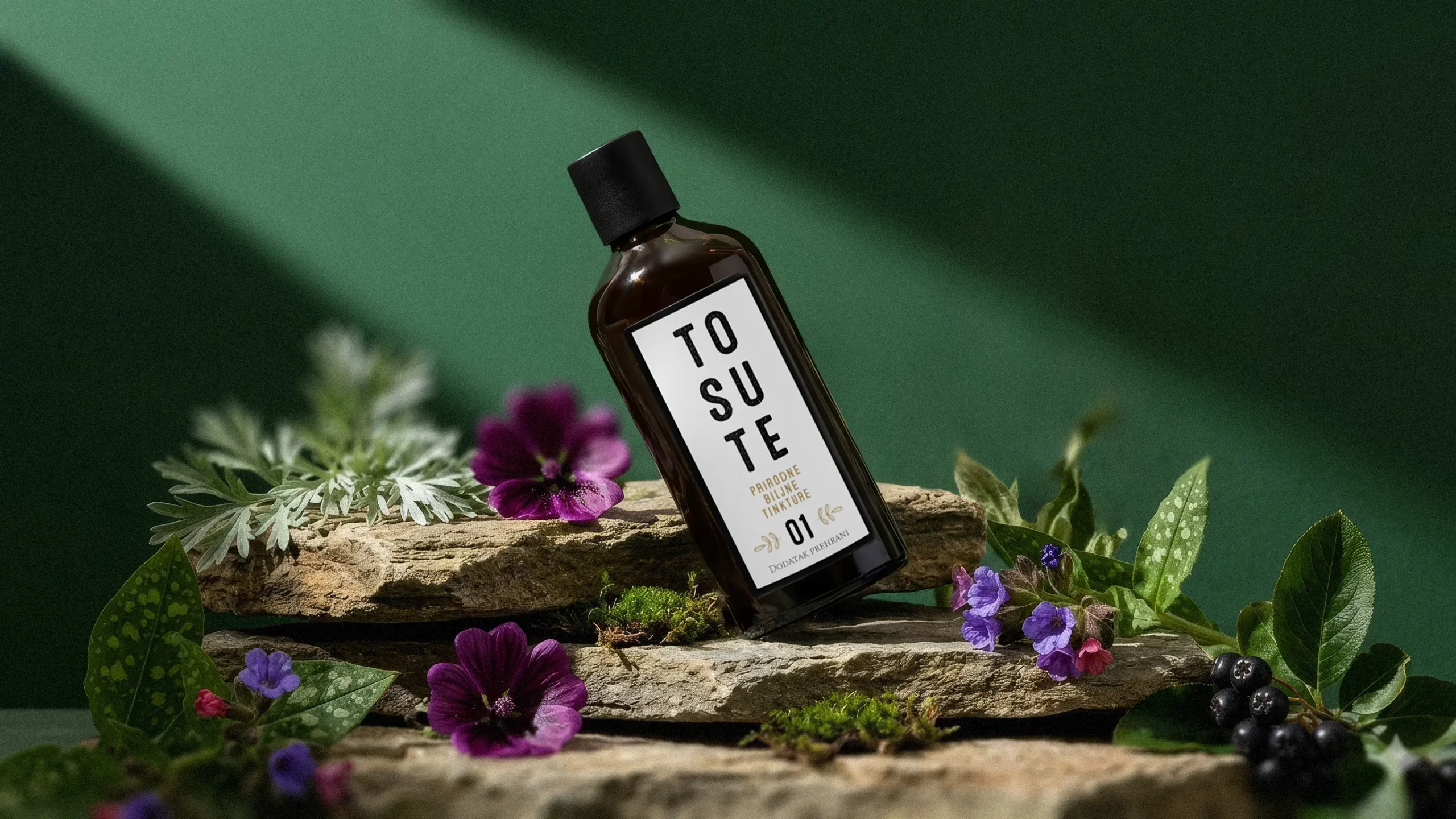 TO SUTE natural herbal tincture bottle displayed on stone with purple flowers