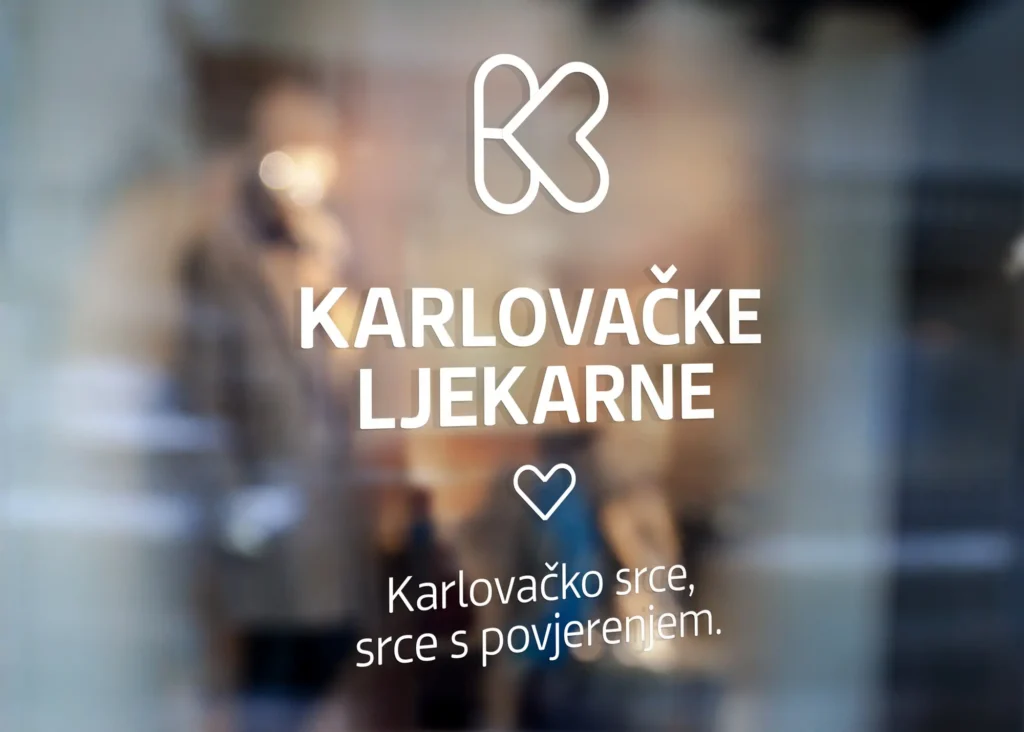 Karlovačke Ljekarne pharmacy logo on frosted glass door with tagline
